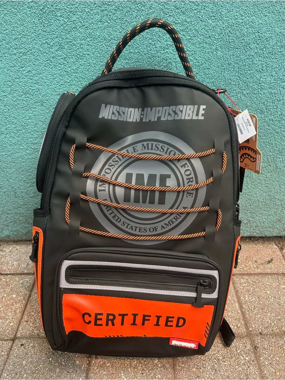 Sprayground Black and Orange 'Mission: Impossible' Certified Backpack